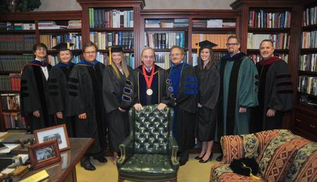 David S. Dockery is joined in his office by Greg A. Thornbury, vice president for spiritual life, Carla Sanderson, executive vice president for strategic initiatives and provost, Gene Fant, executive vice president for academic administration,  Anika Strand, senior class president,  Jimmy H. Davis, Hammons chair of pre-medical studies, Kylie McDonald, SGA president., Hunter Baker, dean of instruction, and Todd Brady, vice president for church relations. - Photo by Morris Abernathy