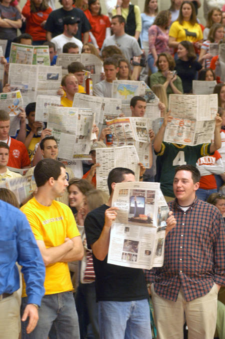 Bulldog fans show their disinterest in the opposing team at the Homecoming basketball game. - Photo by Lindsay Stavish