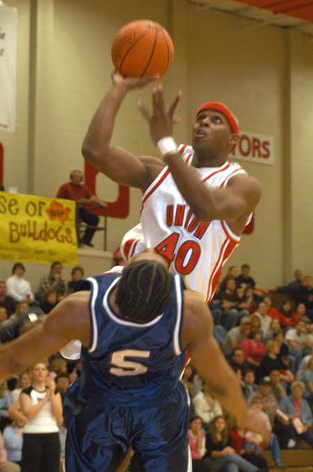 Zach Wiggs (40) takes a shot ove a Lee defender during Union's homecoming game. - Photo by Lindsay Stavish