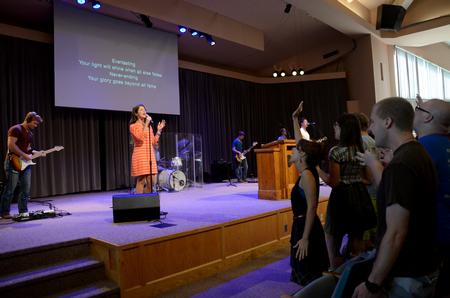 Chapel attendees sing praises in prior to a message from David Landrith, pastor of Long Hollow Baptist Church in Hendersonville.  - Photo by Anne Richoux