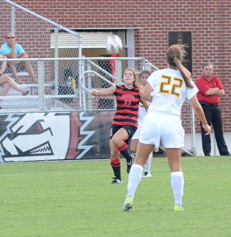 Lady Bulldog, Stephie King, goes in for a header against Belhaven's defender. The Lady Bulldog's came out victorious with a 1-0 win.  - Photo by Ebbie Davis