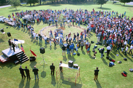 Students gathered to participate in the removal of stones from the altar created in honor of the victims of September 11.  The removal is to symoblize moving on with our lives, while still remembering the victims. - Photo by Amanda Smith