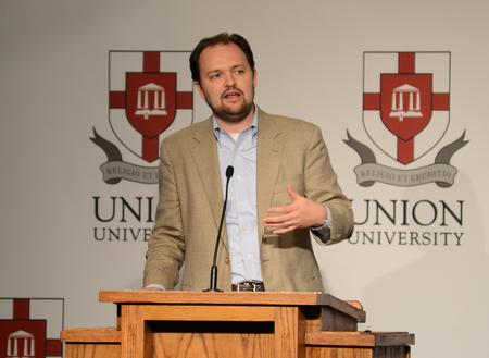 Ross Douthat, columnist for the New York Times, speaks at Union Forum in the Carl Grant Events Center. - Photo by Jacob Moore