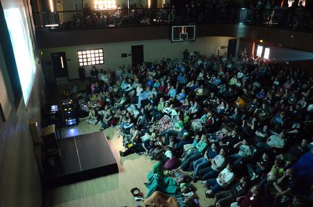 Families enjoy watching Pixar's "Brave" together in the Bowld Student Commons during Family Weekend. - Photo by Jacob Moore