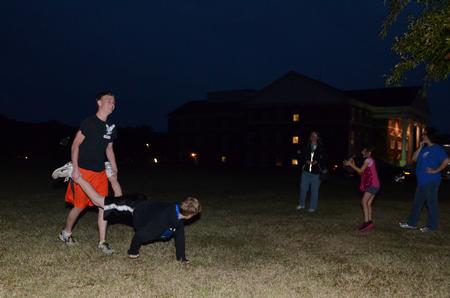 Steven Thompson and Aaron Thompson, brothers of student Brian Thompson, freshman computer science major, compete in Family Olympics during Family Weekend. - Photo by Anne Richoux