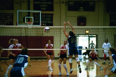 Andrea Darr (No. 5) - senior from Swansea, IL goes for the kill - Photo by Tommy Sadler