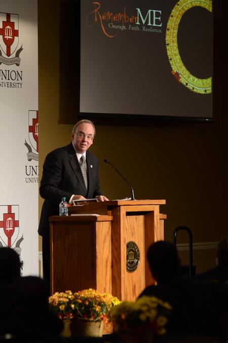 David S. Dockery, president of the university, encourages homicide-loss survivors at the fifth annual Remember Me Commemorative Walk. - Photo by Jacob Moore