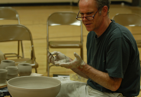 Internationally known artist from Penn State University, Chris Staley, leads in a ceramics workshop. - Photo by Jonathan Blair