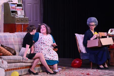 Cast members of <em>A Barrel Full Of Pennies</em> perform a scene in the W.D. Powell Theater. - Photo by Zac Calvert