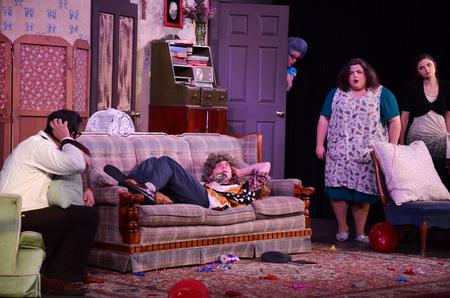 The cast of <em>A Barrel Full of Pennies</em> performs a scene from the comedy. - Photo by Zac Calvert