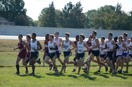 The men's cross country team competes in the Union University Cross Country Invitational held on campus. - Photo by Anne Richoux