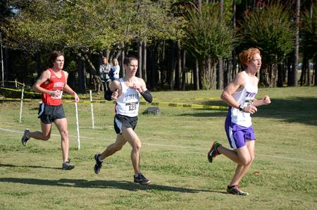 Drake Ott, senior athletic training major, competes in the Union University Cross Country Invitational. The men's cross country team finished third in the invitational.  - Photo by Anne Richoux