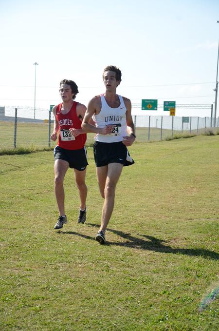 Caleb Creel, junior theology major, competes in the Union University Cross Country Invitational. - Photo by Anne Richoux
