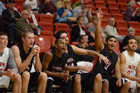 Members of the Union Bulldogs cheer on their teammates as they shoot three pointers during Bulldog Madness. - Photo by Jacob Moore