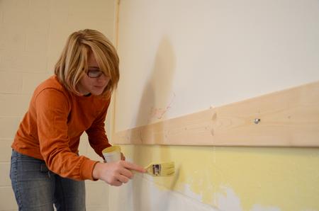Becca Farrell, junior English major, volunteers at the East Chester site of Mission Jackson, an outreach program of Englewood Baptist Church, as a part of the tenth annual Campus and Community Day.  - Photo by Anne Richoux