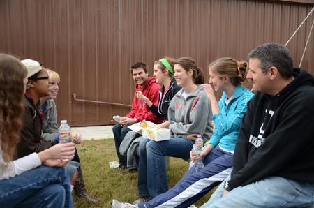Members of the history department enjoy a lunch break at Parker's Crossroads Battlefield during Campus and Community Day. - Photo by Jacob Moore