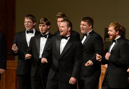 Members of the men's choir perform "Good Old A cappella" during the annual fall choral concert. - Photo by Jacob Moore