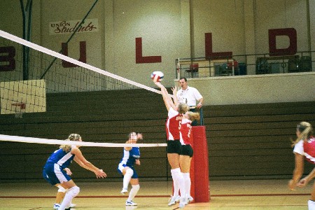 No. 5 Andrea Darr and No. 2 Erin Bayne attempt the block. - Photo by Tommy Sadler