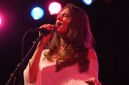 Danielle Young, wife of Caedmon's Call's frontman Cliff Young, sings backup vocals and sometimes lead vocals at their concert during The Spring Thing Weekend. - Photo by Jonathan Blair
