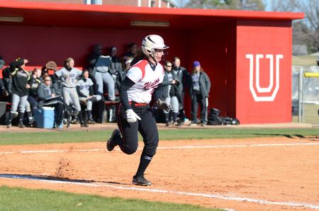 ]Caylee Crews sprints to first base during a Union softball game against Bethel University. - Photo by Anne Richoux