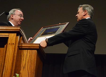 David S. Dockery, president of the university, appoints Walton Padelford as the Porter Family Professor of Business and Economics. - Photo by Matt McDaniel