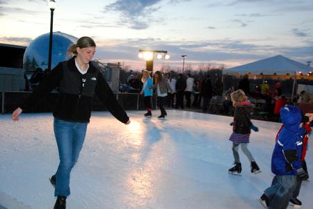 Sarah Welch, senior nursing major, enjoys an ice skating rink as a part of Homecoming Winter Wonderland. - Photo by Anne Richoux