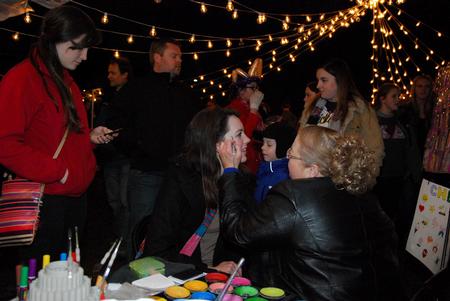 Guests at the Homecoming Winter Wonderland enjoy all of the activities, including face painting.  - Photo by Anne Richoux