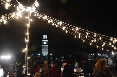 Guests of the Homecoming Winter Wonderland mingle under the string lights as they enjoy hot chocolate, ice skating and fellowship with each other.  - Photo by Olivia Wallace