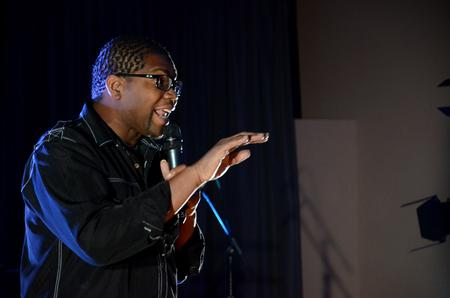 Comedian Bone Hampton performs during the Homecoming concert in the Savage Chapel. - Photo by Anne Richoux