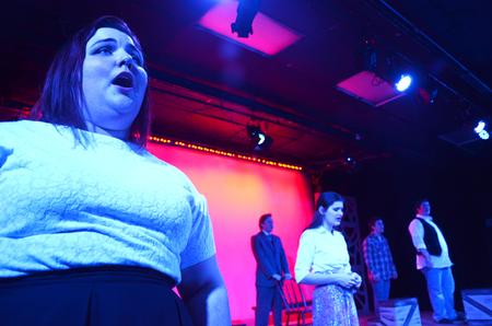 Caitie Vance, sophomore theatre and speech major, performs with fellow actors in Cotton Patch Gospel. - Photo by Olivia Wallace