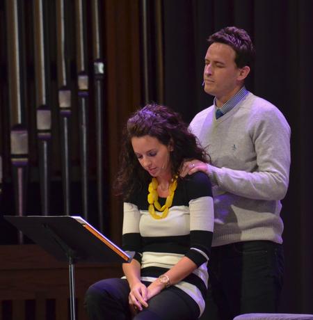 Ben Mandrell, pastor of Englewood Baptist Church, demonstrates how to pray with and for his wife Lynley during the Crabtree Family Life Series chapel. - Photo by Morris Abernathy