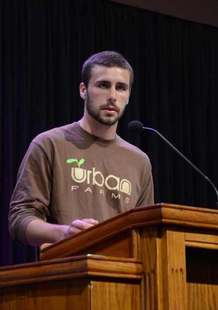 Chris Hare, freshman digital media studies major, gives his perspective during chapel on the Memphis GO Trip he participated in over Spring break. - Photo by Jacob Moore