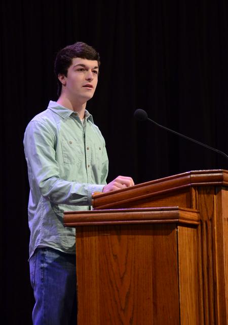 Brennan Kolby, freshman biblical studies major, talks during chapel about the impact the Louisville GO Trip had on his perspective of missions. - Photo by Jacob Moore