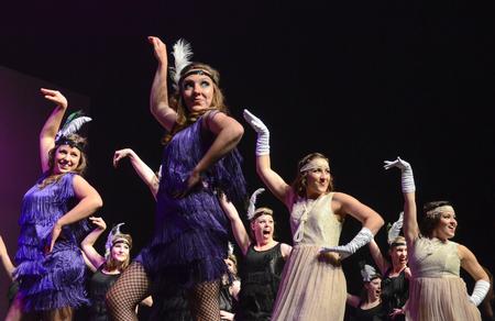 At center, Elizabeth Oakes, junior public relations major, heads up a dance routine during Kappa Delta's performance at the 16th annual Variety Show. - Photo by Jacob Moore