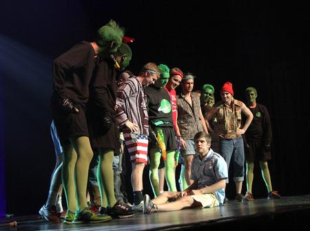 Joey Davis, junior marketing major, plays Petey, a college kid who just found out the alien attack was just a performance for his 21st birthday during the Lambda Chi Alpha performance during the 16th annual Variety Show at the Carl Perkins Civic Center. - Photo by Matt McDaniel