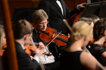 Mark Bolyard, professor of biology and department chair, plays viola at the orchestra recital at First Baptist Church. - Photo by Matt McDaniel