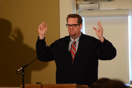 Hunter Baker, associate professor of political science, speaks at the Salt and Light conference at the Carl Grant Events Center. - Photo by Matt McDaniel