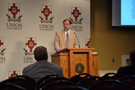 Hal Poe, Charles Colson professor of faith and culture, speaks about Chuck Colson's last book "The Faith" during the Salt & Light conference sponsored by the Center for Politics and Religion. - Photo by Olivia Wallace