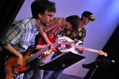 Andrew Pearson, Jesse Joyner, and Shane Caver perform with the jazz band in concert.  - Photo by Anne Richoux
