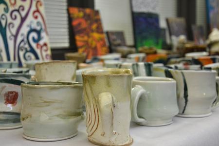 Students sell their art at the annual mother's day pottery sale as a way to raise money for the Potter's Guild, as well as earn income for themselves.  - Photo by Olivia Wallace