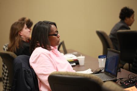 Adult students listen and take notes during a class in the Center for Continuing and Professional Studies.  - Photo by Kristi McMurry Woody