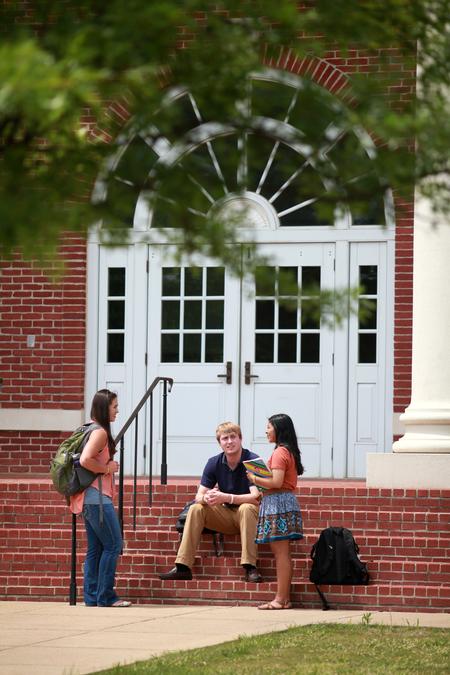 A group of students chats outside of Jennings Hall between classes.  - Photo by Kristi McMurry Woody