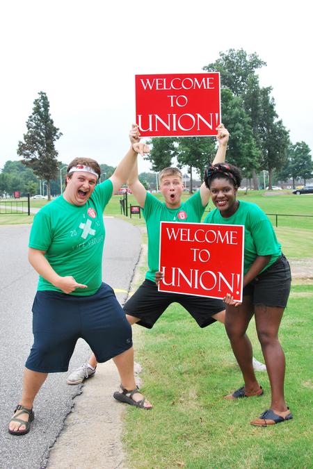 Life Group leaders show excitement as they wait for new students to arrive on move-in day.  - Photo by Anne Richoux