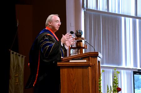 David S. Dockery, president of the university, welcomes faculty, staff, students and guests to Fall Convocation in the G.M. Savage Memorial Chapel.  - Photo by Anne Richoux