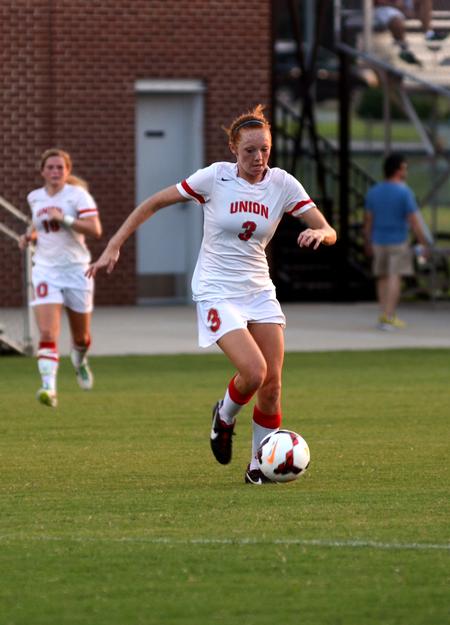 Lady Bulldog Kayleigh Patterson dribbles the ball down the field at a home exhibition game against Rhodes College. - Photo by Amanda Rohde