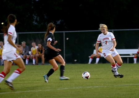 Lady Bulldog Abby Taylor challenges Rhodes College for the ball during the opening exhibition game of the season. - Photo by Amanda Rohde