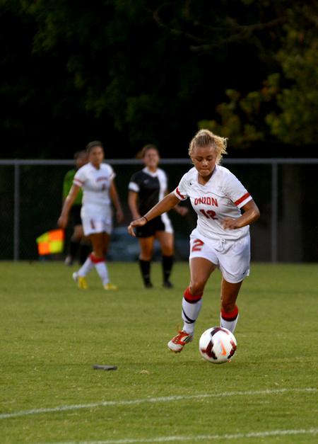 Lady Bulldog Elizabeth Clark drives the ball down the field during a home game against Rhodes College. - Photo by Amanda Rohde