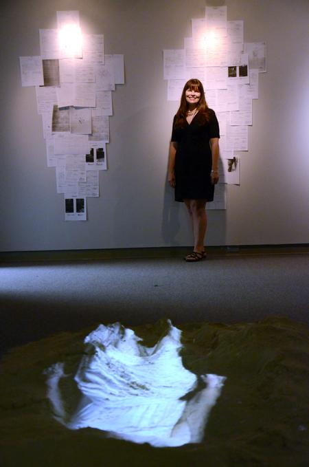 Angela D. Lee, visiting artist and alum, shared her story in creating "Stories Beneath the Water," an art exhibit featured in the Union art gallery regarding the Tennessee Valley Authority in the 1940s. - Photo by Amanda Rohde