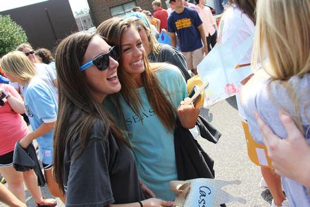 Hannah Richardson, sophomore biology major, congratulates Mary Mattison Evans, freshman, for becoming a new member of Zeta Tau Alpha at the conclusion of Panhellenic bid day. - Photo by Matt McDaniel