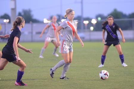 Lady Bulldog Alex Taylor dribbles the ball past Trevecca Nazarene University players at the Smith Memorial Soccer Complex. The Lady Bulldogs won the game 1-0. - Photo by Anne Richoux